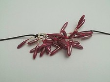 lanière avec , perles,breloques anciens,création bijoux, broches,collier 01