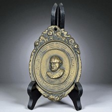 Plaque sculptée métal fonte