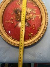 Cadre vintage ovale bombé bouquet de fleurs séchées et tissus