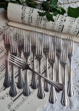 12 ANCIENNES FOURCHETTES METAL ARGENTE CHRISTOFLE MODELE PRINTANIA