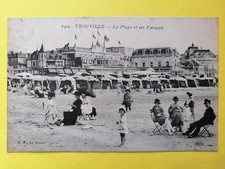 cpa Normandie TROUVILLE La PLAGE et ses PARASOLS Tentes de Bains Écrite en 1922
