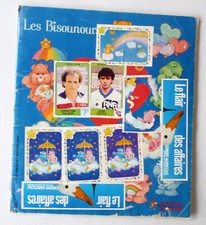 album de vignettes les bisounours panini 1986 manque 18 images  dans l'etat