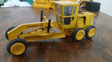 NZG niveleuse CATERPILLAR 1/50 BTP chantier no conrad joal gescha  box liebherr