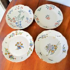 Nevers ou La Rochelle. 4 assiettes en faïence décor de fleurs, XVIIIe siècle