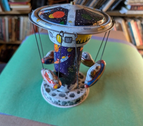 Rocket carousel tin toy - rocket,