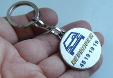 Porte clé Neubauer Groupe Peugeot Jaguar Land Piazzo Vespa Guzzi..... Village.