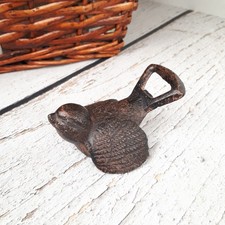 Décapsuleur ancien en fonte patiné figurine d'oiseau ouvre-bouteille original
