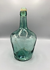 Ancienne dame jeanne V. LEVANTE, bonbonne bleu en verre