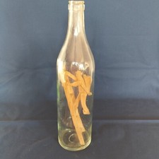 BOUTEILLE AVEC VENDANGEUR A LA