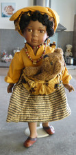 POUPEE METISSE EN PORCELAINE