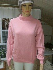   superbe pull rose  60 % laine - 20 % angora   taille  42 / 44   parfait état
