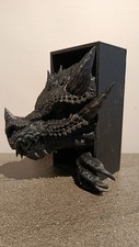 serre livres tête de dragon