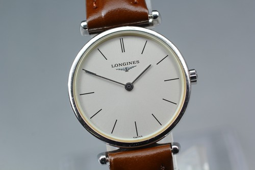 Comme neuf montre - neuf],