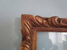 Cadre  ancien en bois sculpté