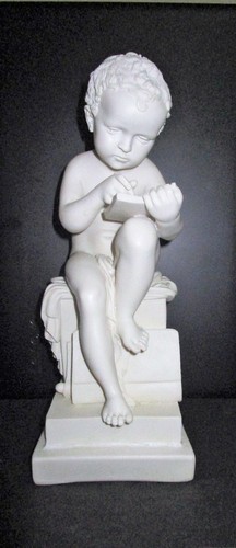 Figurine sculpture écriture