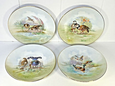4 Assiettes en porcelaine