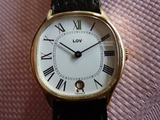  MONTRE HOMME  MECANIQUE A REMONTAGE MANUEL " LOV " FABRICATION FRANCAISE