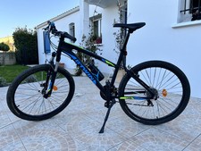 Vélo rockrider 340 noir et bleu adolescent 16 pouces