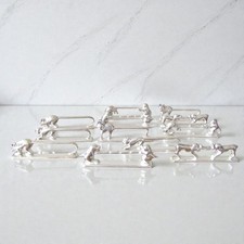 Orfèvrerie. 12 porte-couteaux