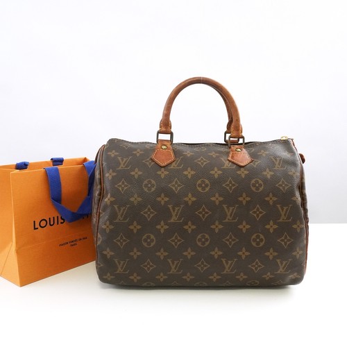 Sac main louis - main,
