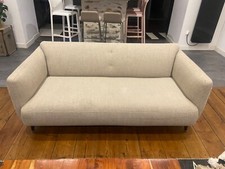 canapé modèle MODENA de chez BoConcept, tissu Lazio beige, striée laquée noir