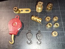 Lot pieces MECCANO anciennes - palan ref 151 + 2 crochets + pignon +bagues arret