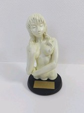* Figurine en céramique