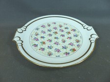 Ancien plat de service de table en porcelaine P.L France décor fleurs et dorures