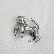 Pendentif cheval dessus argent