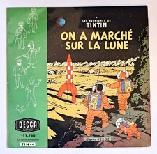 Tintin marche sur - a,