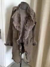 Superbe manteau  cuir fourrure