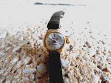 montre dame or 18k  tete aigle* fonctionne **manuel*