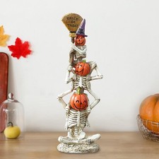 Statue de citrouille squelette