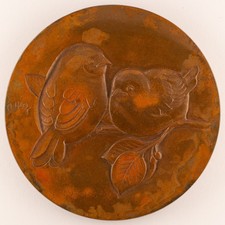 Médaille Deux oiseaux sur une