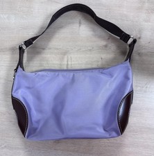 Sac Lancel porté épaule en