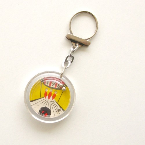 Porte clef ancien publicitaire - porte,
