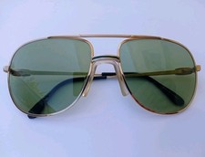 LUNETTES LACOSTE 101 57[]17 GOLD GREEN TONE PHOTOCHROMIC CRYSTAL. SUNGLASSES