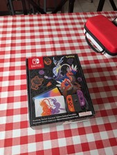 Switch OLED Pokemon +Accessoires Et 2 Jeux 