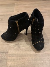 Talons bottes cloutés noirs