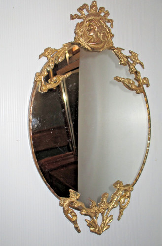 Miroir mural ovale ancien