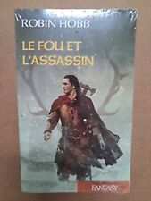 NEUF LIVRE ROMAN FANTASY LE FOU ET L ASSASSIN ROBIN HOBB  SOUS BLISTER