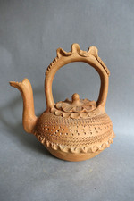 Théière ancienne en terre