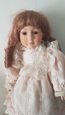 Poupée en porcelaine de collection, trés jolie Modéle 55  cm
