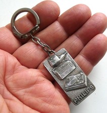 Ancien porte clé métal PHILIPS Rasoir Radio Transistor Platine Tourne Disque A60