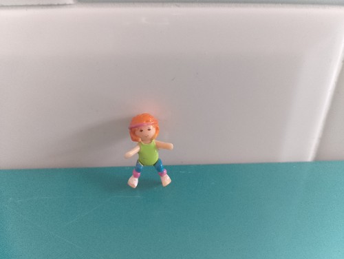 Polly pocket figurine doll