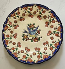 ASSIETTE EN FAIENCE EMAUX