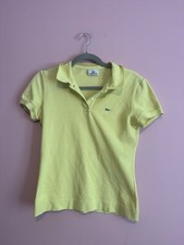 Polo Lacoste femme jaune taille 40 en superbe état