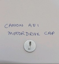 Bouchon d'entraînement moteur Canon AE 1 pièce d'origine d'occasion