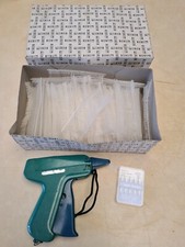 Etiqueteuse à vétement avec 5 broche et attaches