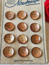 Plaque lot 12 boutons anciens